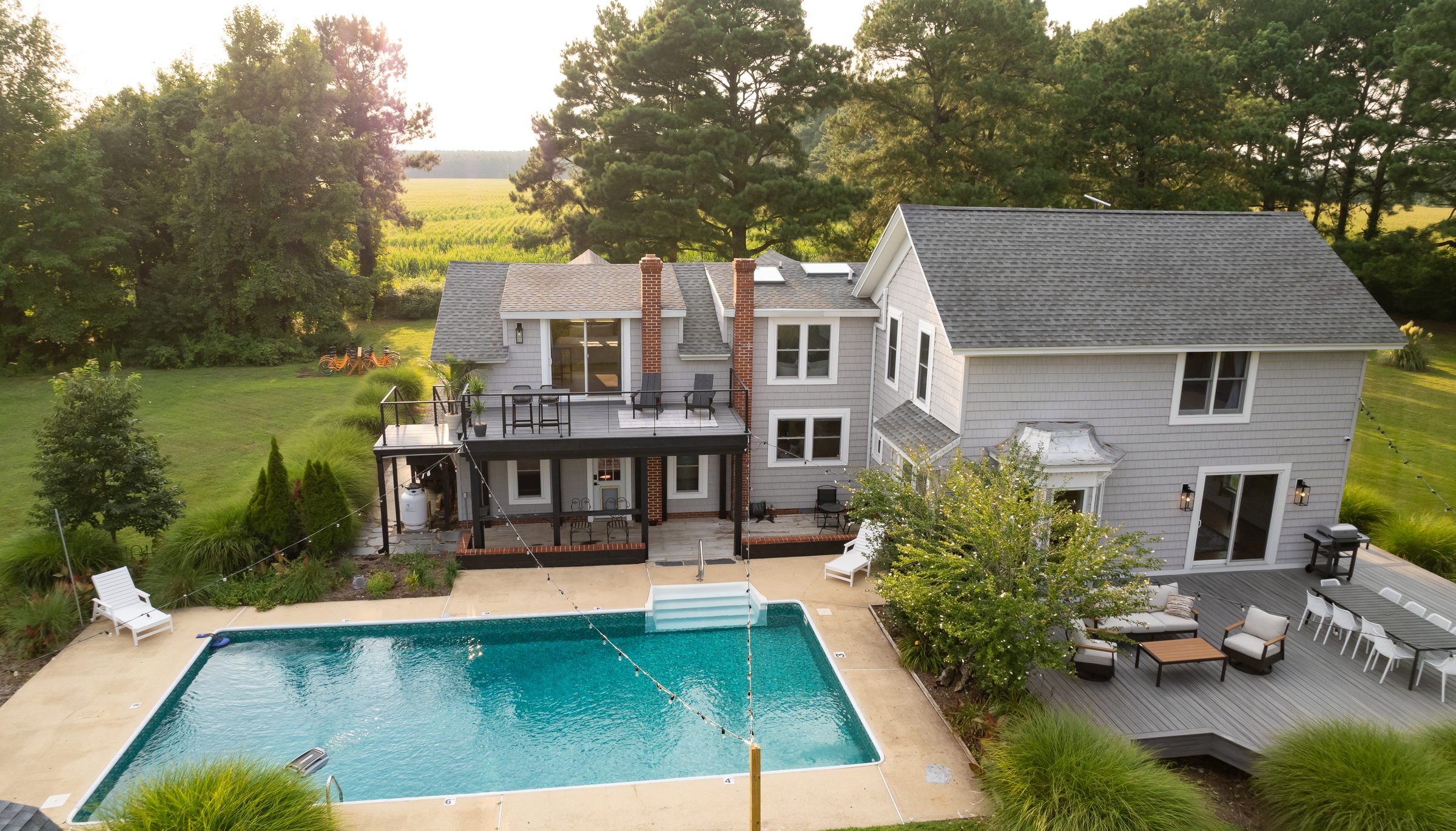 Aerial view of the pool, decks and lawn at Blackwater Bend
