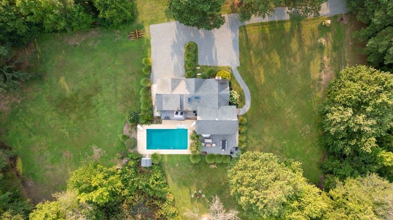Overhead view of the house, pool and surrounding farm