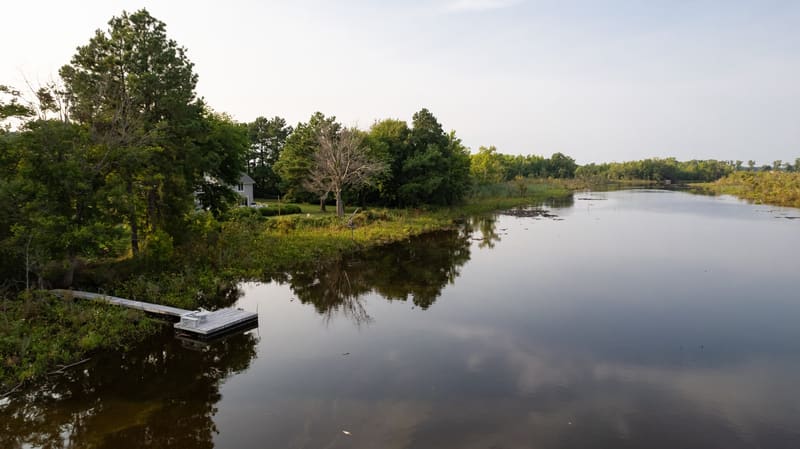 Wide aerial of the river and dock