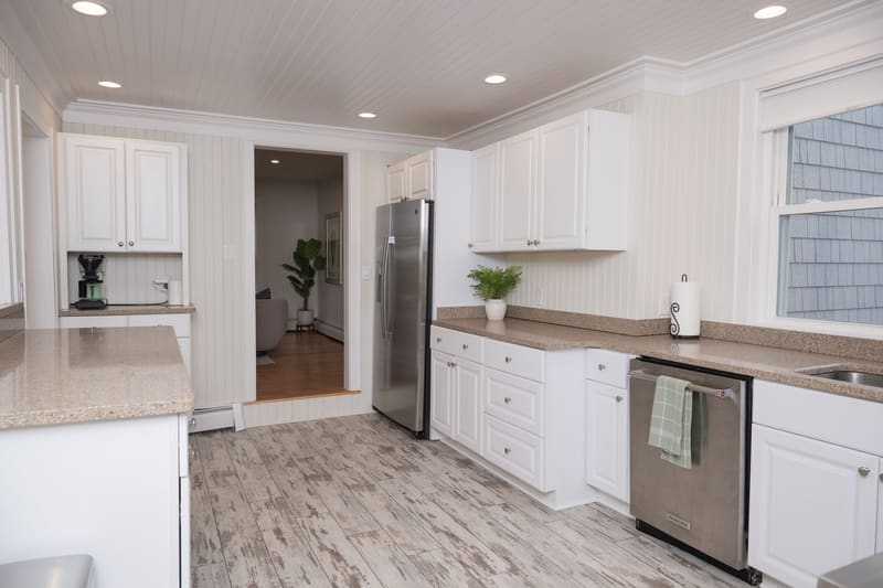 Full kitchen with stainless appliances and long counters