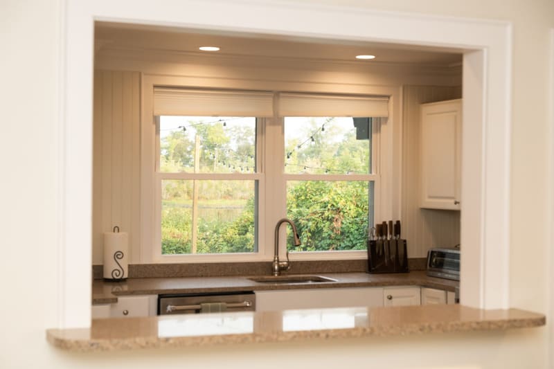 The kitchen sink window looking out over the water