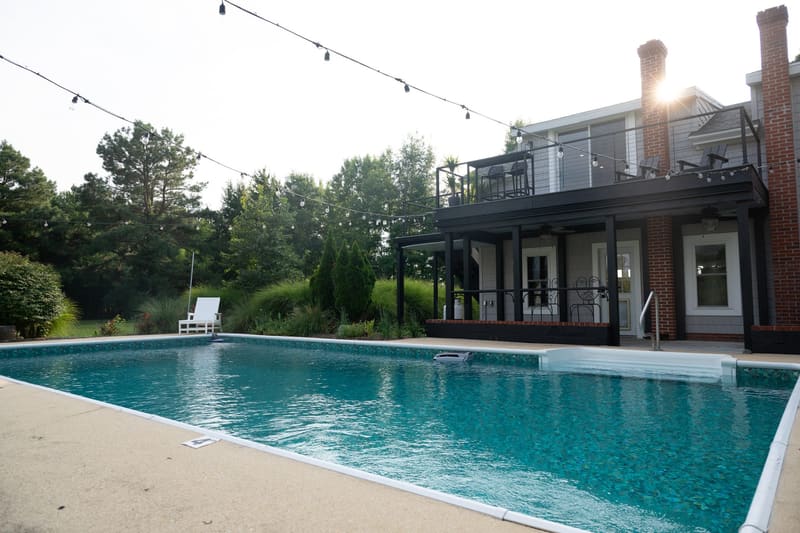 The pool and house in evening light